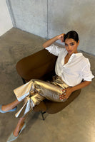 Thumbnail for Model wearing Gold Vegan Leather Trouser