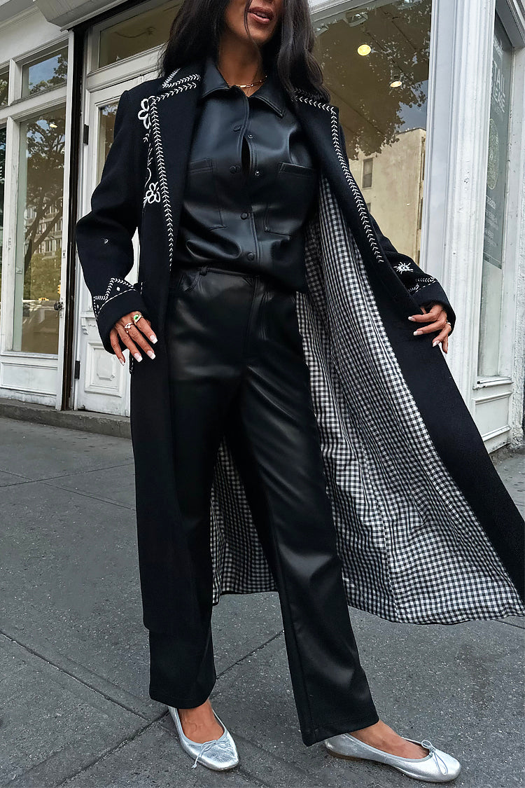 caption_Model wears Black Embroidered Geneva Coat in M