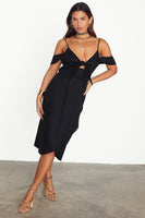 Thumbnail for caption_Model wears Black Cassie Dress in UK size 10/ US 6