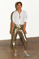 Thumbnail for caption_Model is 5ft6 and wears Gold Vegan Leather Trousers in UK 8 / US 4