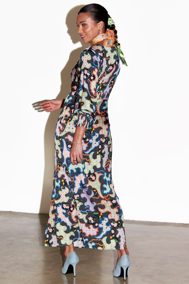 caption_Model wears Black Magnolia Louella Dress in UK size 10/ US 6