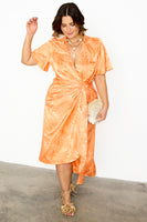 Thumbnail for caption_Model wears Apricot Palm Vienna Dress in UK size 18/ US 14