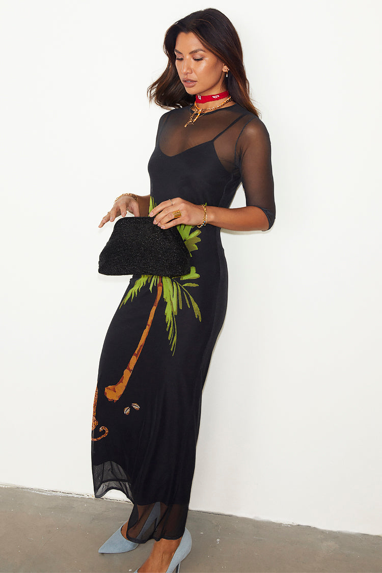 caption_Model wears Black Ibiza Mesh Izzy Dress in UK size 10/ US 6