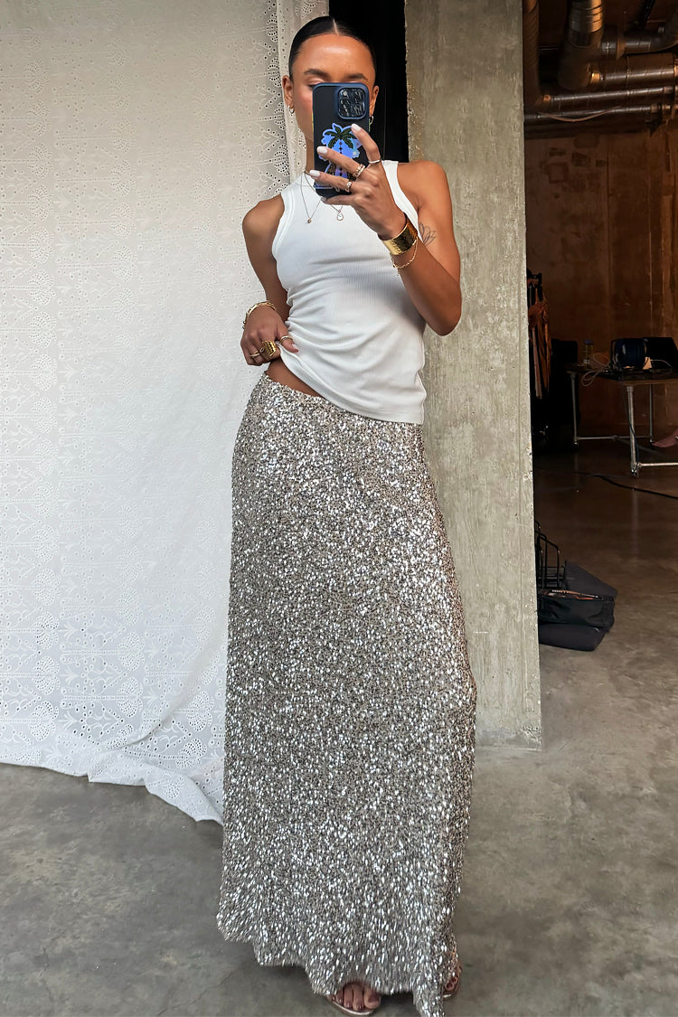caption_Model wears  Silver Sequin Dorris Skirt in UK size 10/ US 6