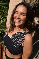 Thumbnail for caption_Model wears Black Leaf One Shoulder Bikini Top  in UK size 16/ US 12