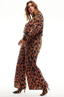 Thumbnail for Model wearing Animal Jumpsuit standing facing the camera side ways