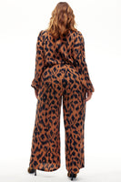 Thumbnail for Model wearing Animal Jumpsuit standing facing away from the camera