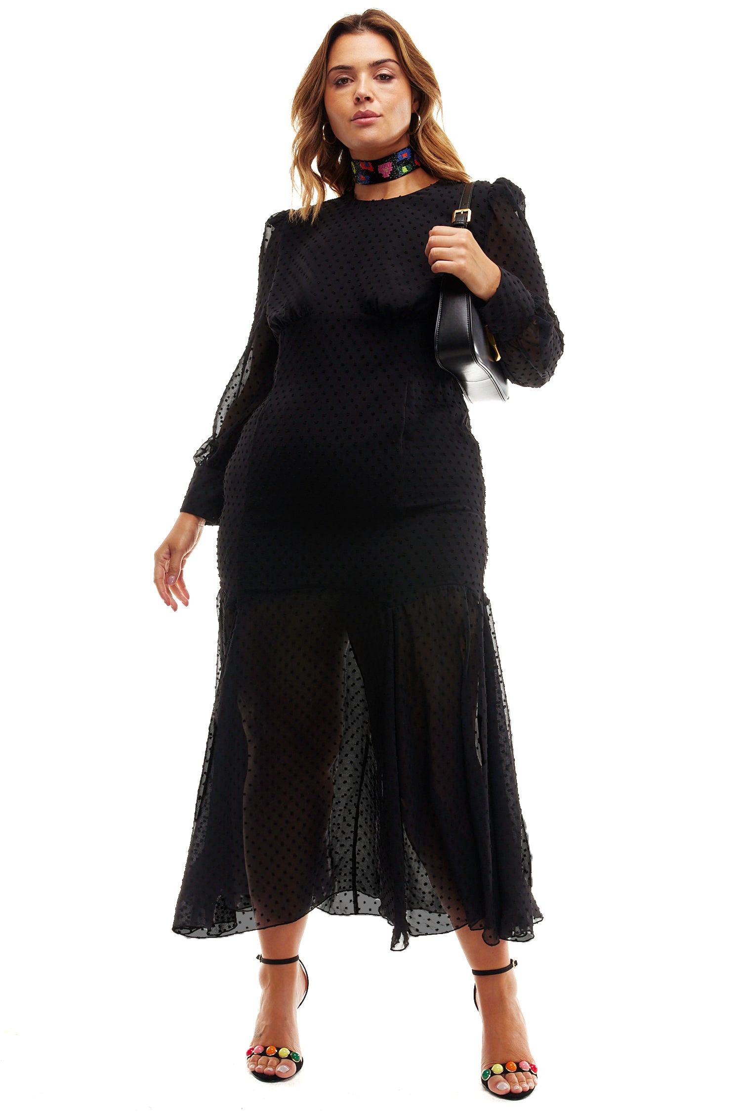 Model wearing Black Dobby Midi Dress standing facing the camera