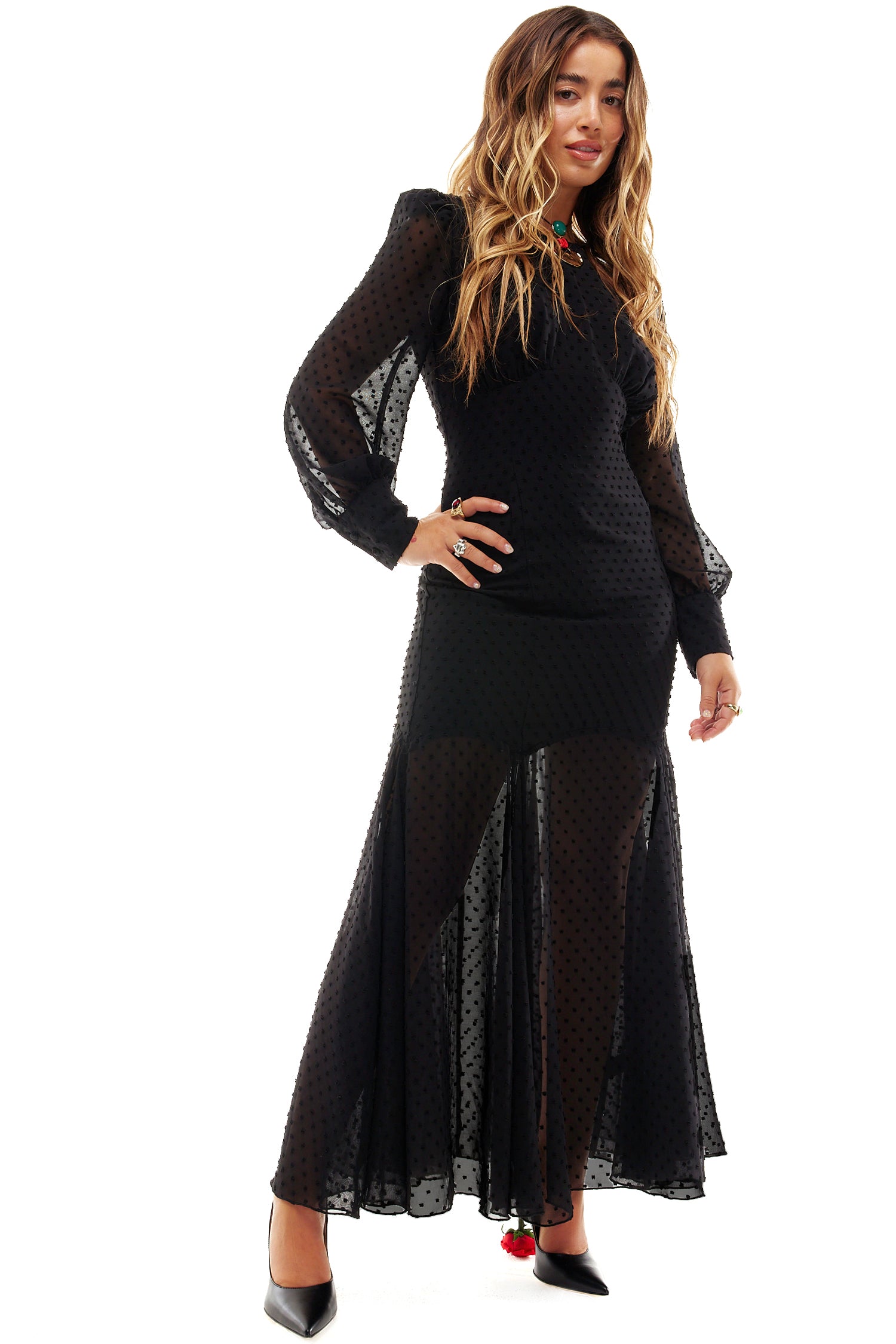 Model wearing Black Dobby Midi Dress standing facing the camera