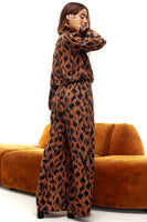 Thumbnail for Model wearing Animal Jumpsuit standing facing away from the camera
