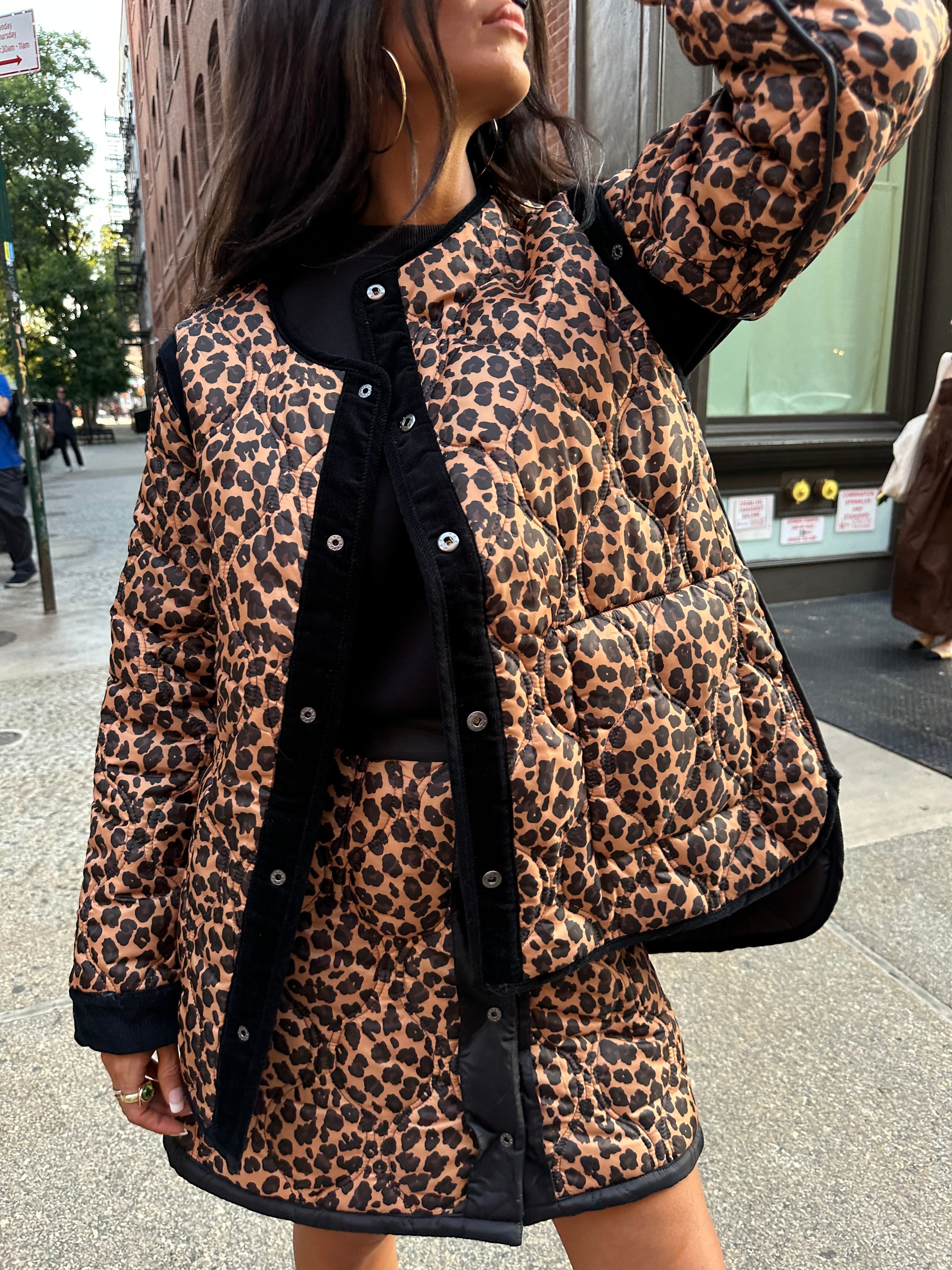 close up of model wearing Black And Leopard Multi-Wear Jacket