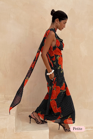 Black Poppy Sophie Dress Petite featuring a polka dot and red floral print with a long trailing scarf detail.