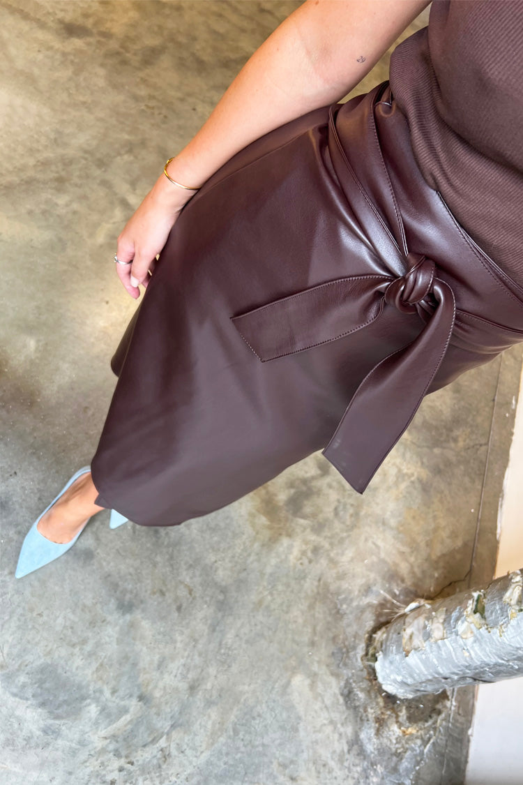 Model wearing Chocolate Vegan Leather Jaspre Skirt close up