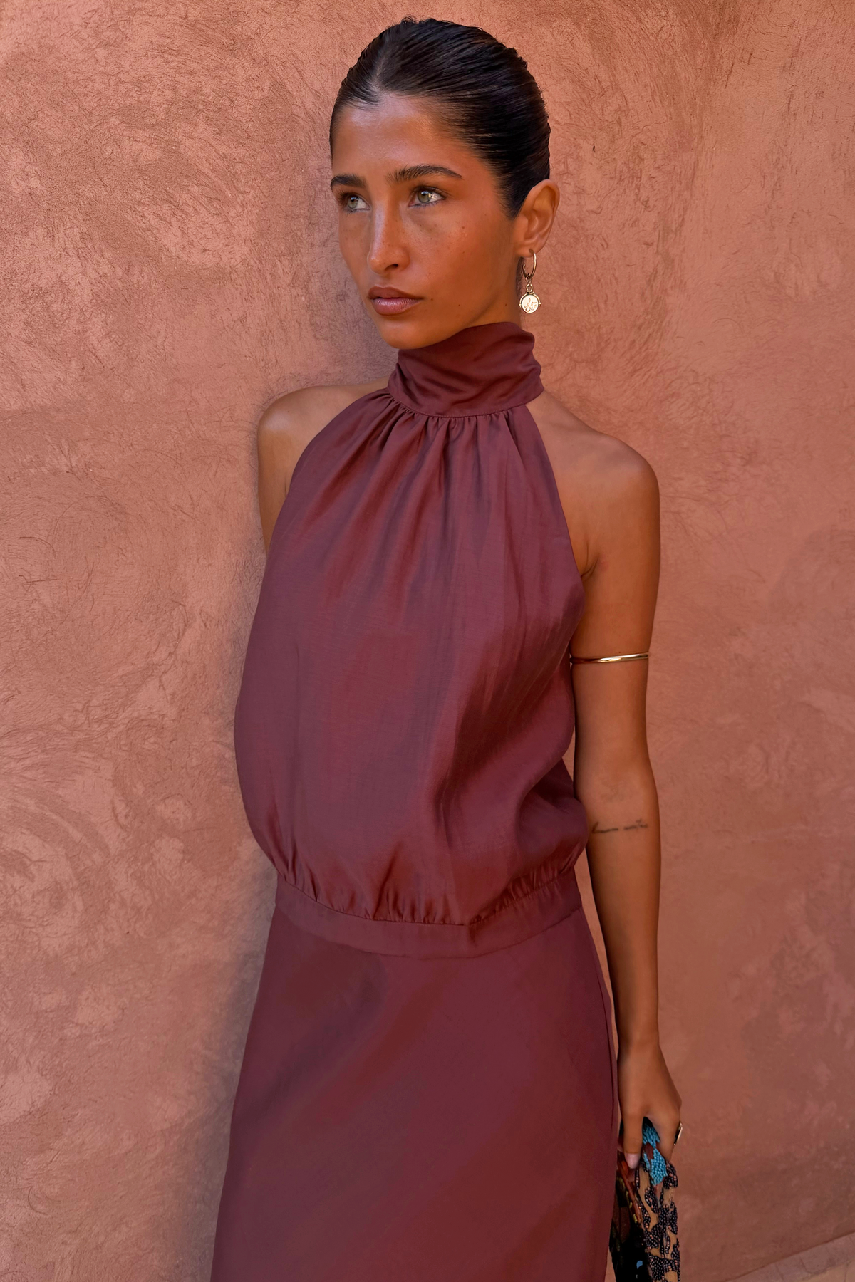 Chocolate Billie Top with a high halterneck and soft gathers, a multi-wear statement staple in a rich chocolate tone.
