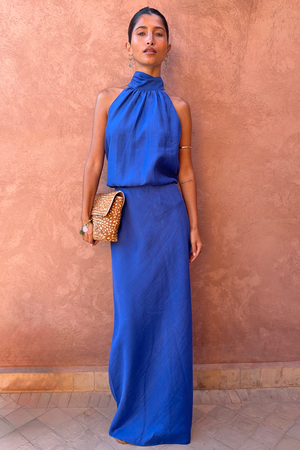 Cobalt Billie Top with a high scarf neckline and gathered front, styled as a vibrant blue co-ord with a matching skirt.