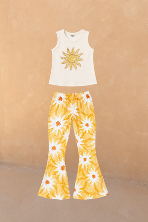 Girl's Yellow Sun Cotton Set featuring a cream sequinned sun vest and flared trousers in our iconic soleil sun print.