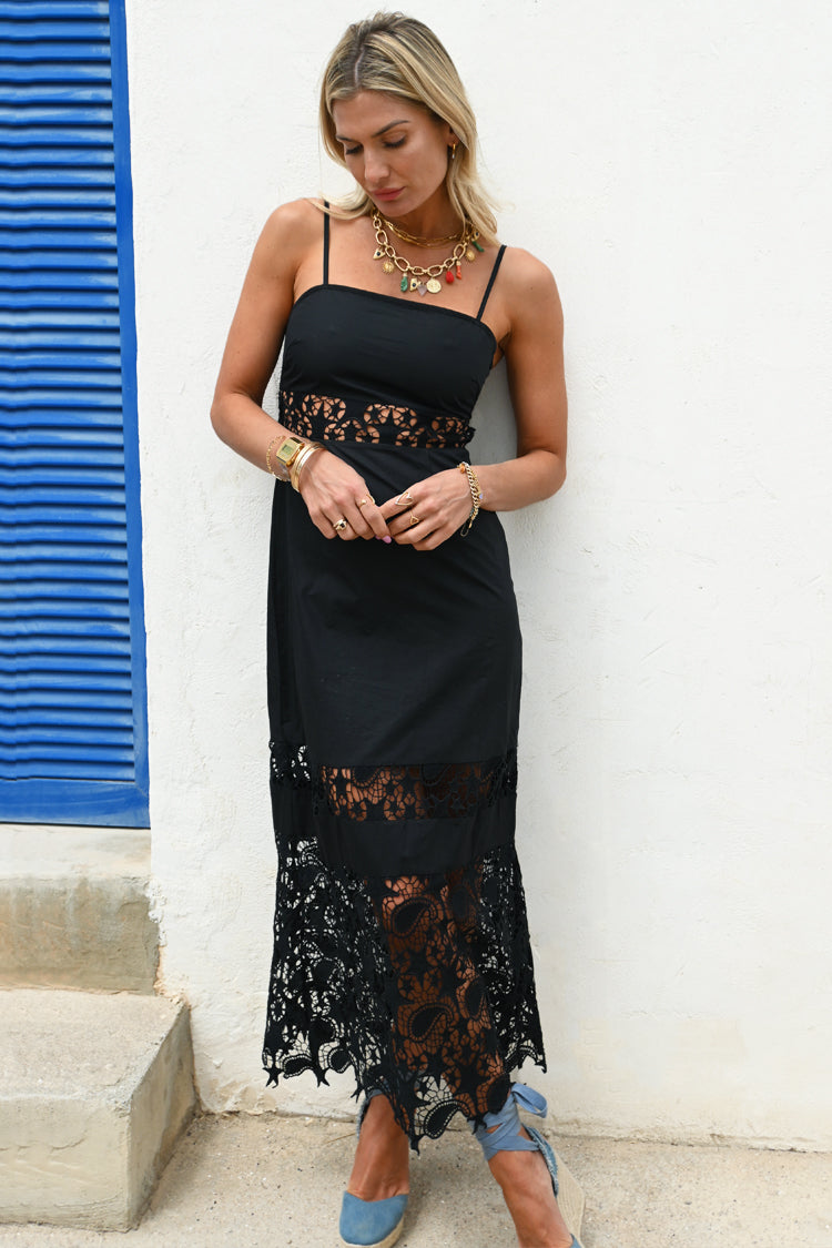 Model wearing Black Star Sasha Dress standing facing the camera