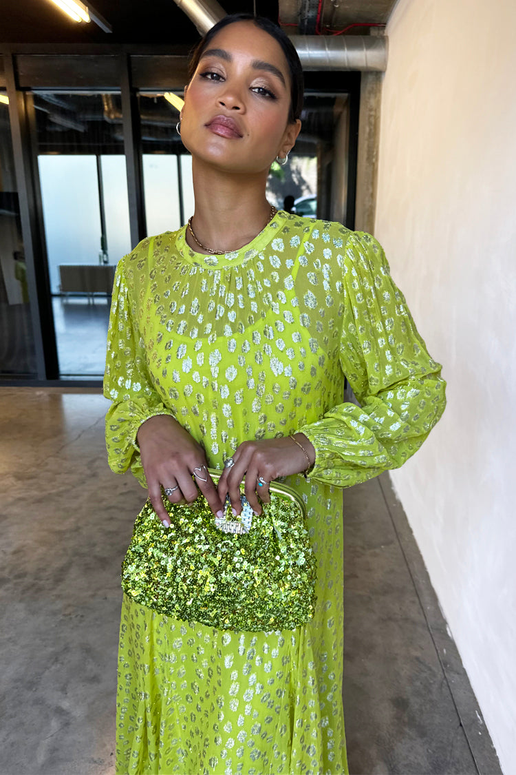 Model wearing Lime Sequin Clutch Bag