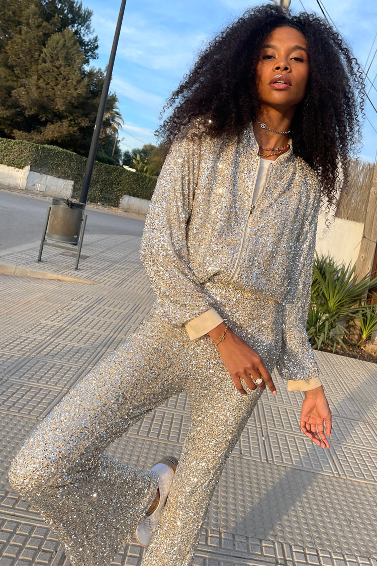 Model wearing Sequin Flared Trousers 