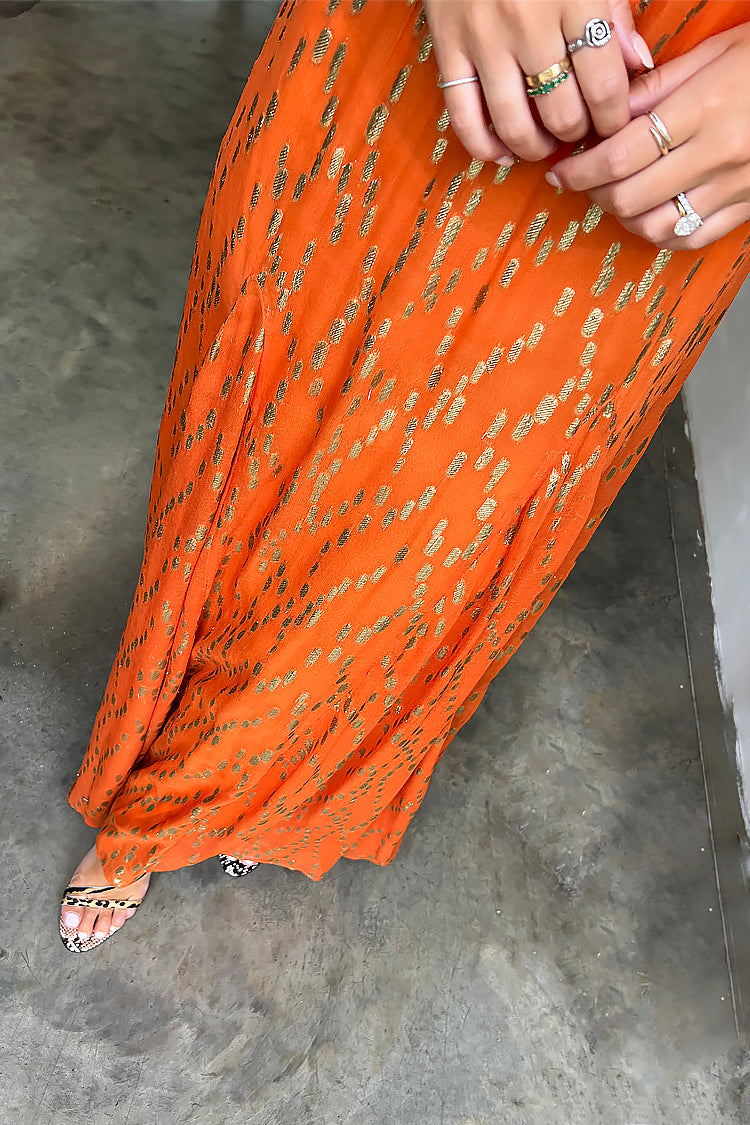 Model wearing Orange Jacquard Bibi Dress