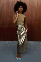 Thumbnail for caption_Model is 5ft6 and wears Gold Vegan Leather Jaspre Skirt in UK 8 / US 4