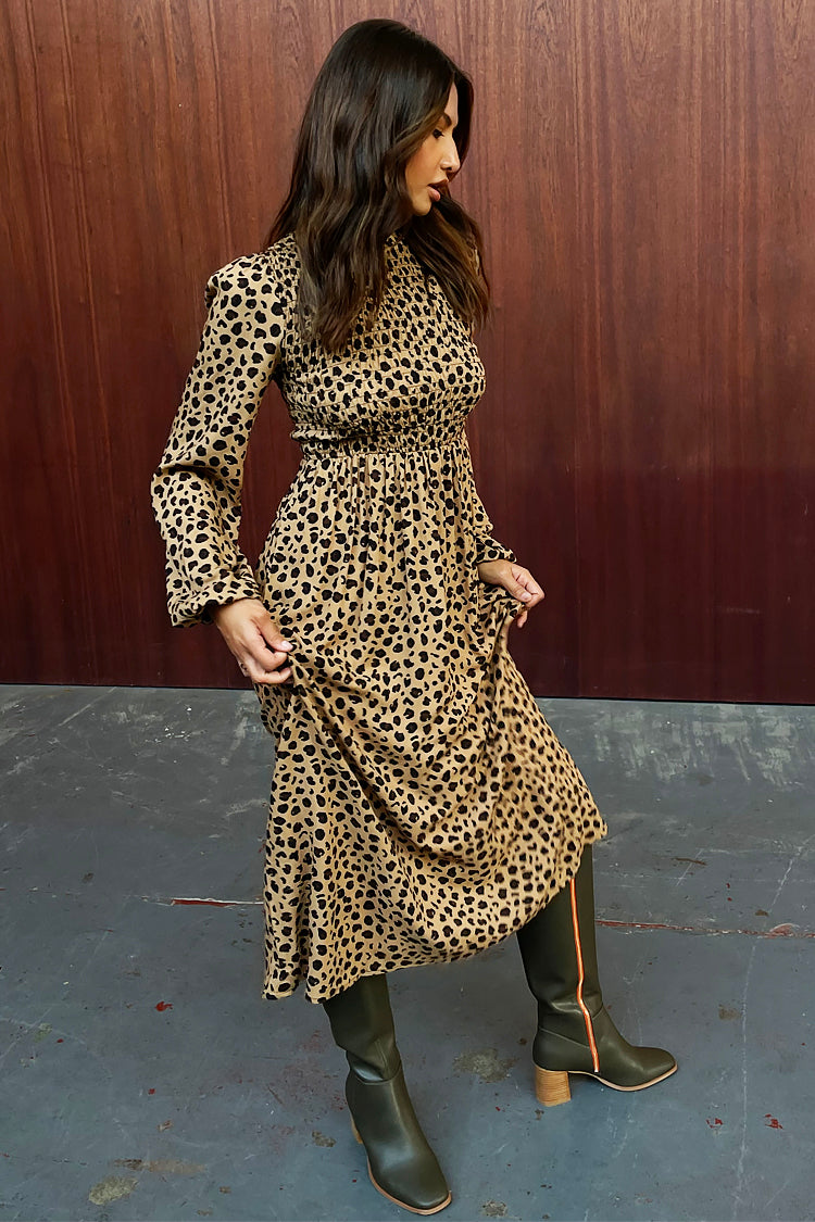 caption_Model wears Leopard Swedish Dress in UK 8 / US 4