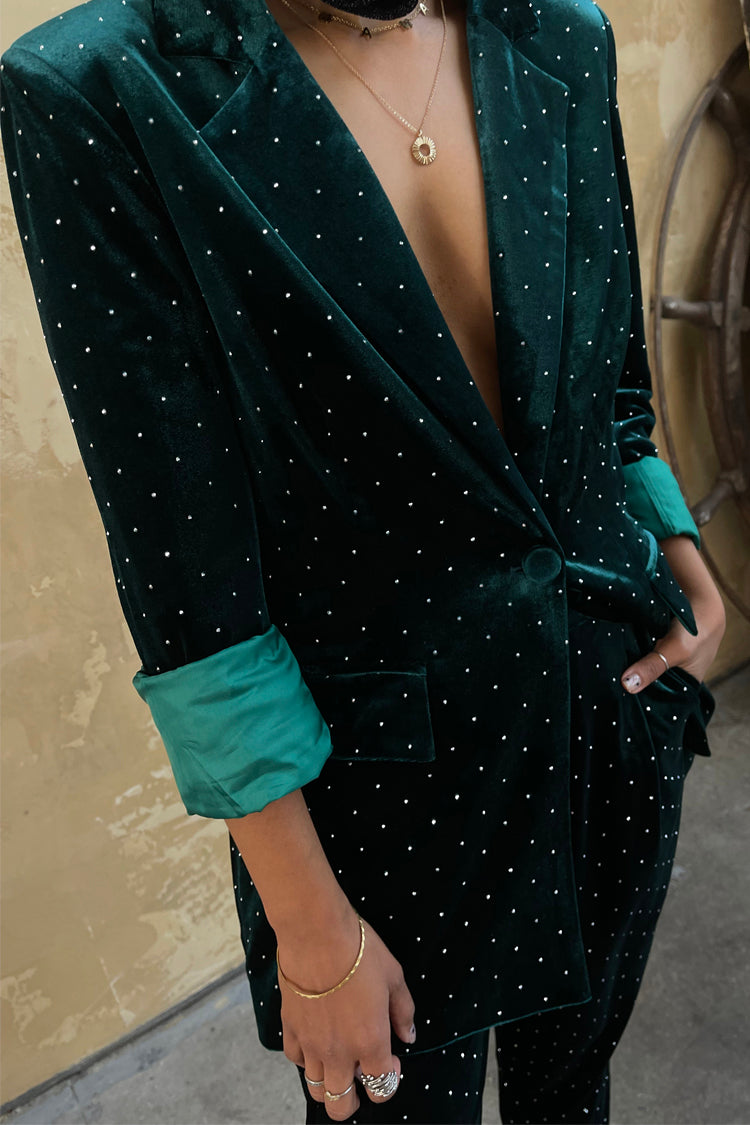 Model wearing Emerald Velvet Quinn Blazer with rolled up sleeves
