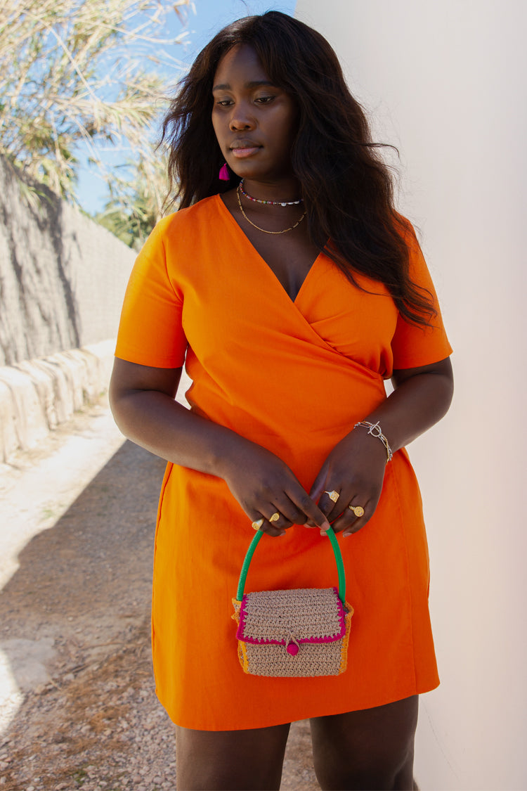  Model wearing Orange Cotton Linen Mini Wrap Dress facing the camera