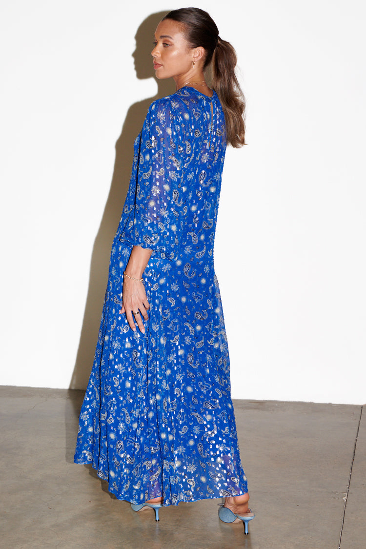 caption_Model wears Blue Running Wild Paisley Bibi Dress in UK size 10/ US 6