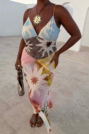 Abstract Soleil Emilia Dress in a pastel sun print with adjustable straps and panelled detailing on a curve model.