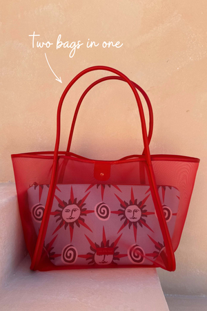 Red Mesh Tote Bag with leather straps and a detachable sun face print pouch, highlighting the two-in-one design.