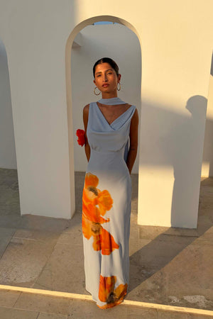 Ice Blue Floral Sophie Dress featuring a drape neckline, large orange floral print and a multi-wear neck scarf.