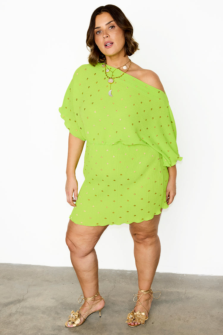 caption_Model wears Lime Plisse Mini Tilly Dress in UK size 10/ US 6