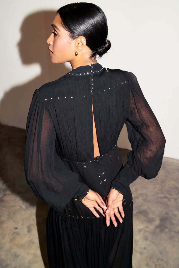 caption_Model wears Black Studded Azelea Dress in UK 8 / US 4