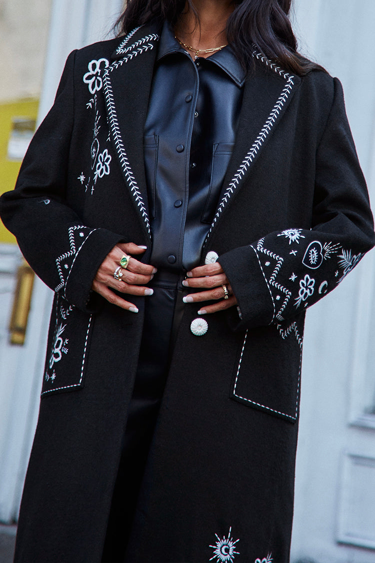 model wearing Black Embroidered Geneva Coat