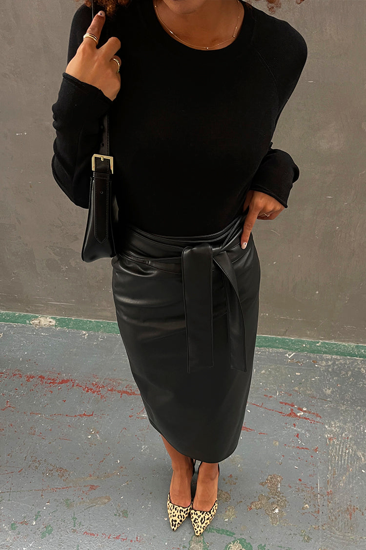 caption_Model is 5ft6 and wears Black Vegan Leather Jaspre Skirt in UK 8 / US 4