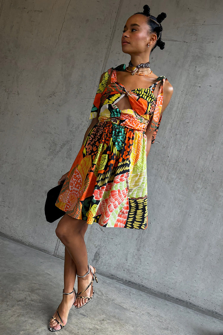 caption_Model wears Fiji Antonia Mini Dress in UK size 10/ US 6