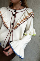 Thumbnail for caption_Model wears  Cream Austin Cardigan in UK size 10/ US 6