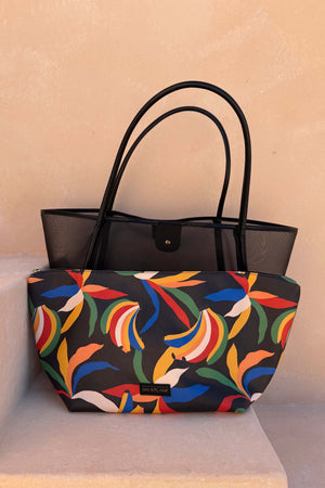 Black Mesh Tote Bag with leather straps and a colourful banana print detachable pouch, a vacation essential.