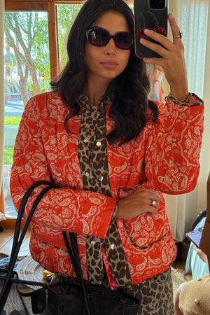 Red Bandana Reversible Jacket in quilted fabric with leopard print trim, model wears size M.
