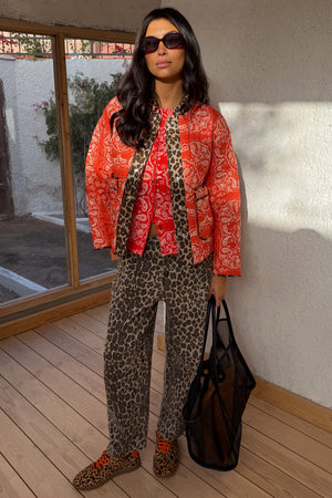 Red Bandana Reversible Jacket in quilted fabric with leopard print trim and in-house designed print.