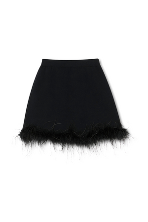 Black Jake Skirt with a detachable feather trim, featuring a weighty knit fabric and an elasticated waistband.