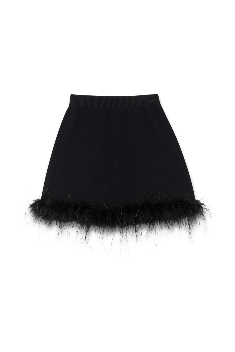 Black Jake knit mini skirt featuring a thick elasticated waistband and detachable feather trim along the hemline.