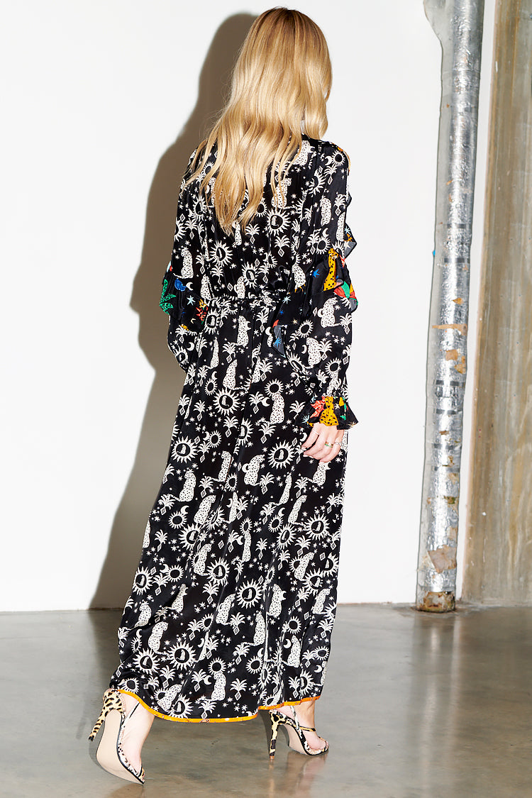 Model wearing Black Paradise Leopard Darcey Dress 