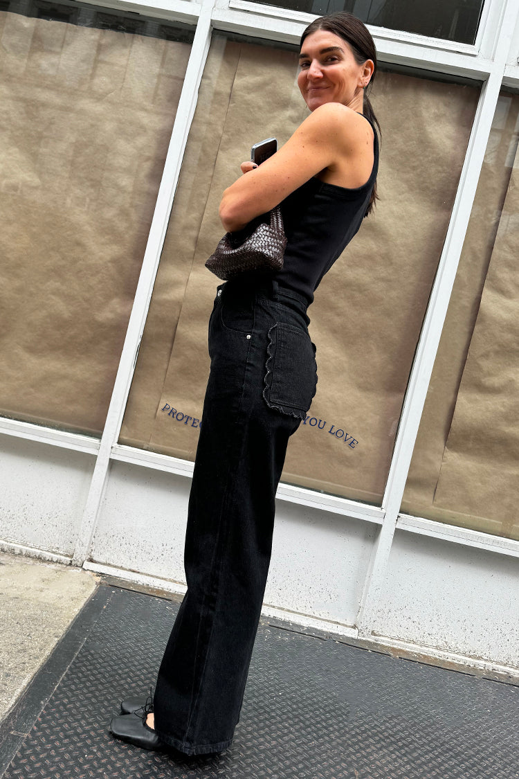 caption_Model wears Black Scallop Detail Jeans in UK size 10/ US 6