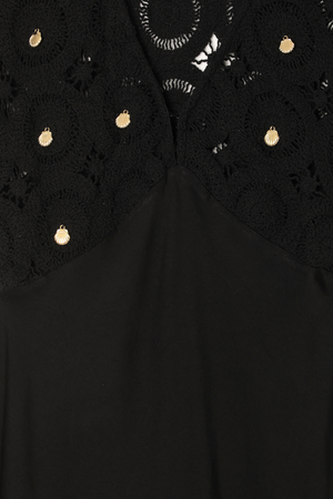 Black Crochet Shell Elodie Dress detail featuring gold shell charms on a crochet bodice and satin fabric.