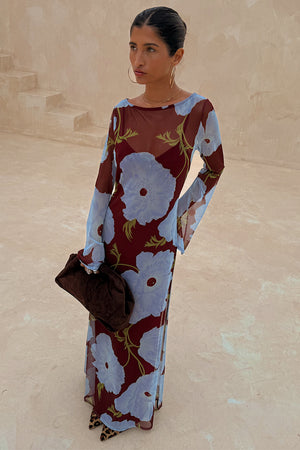 Burgundy & Blue Poppy Aria Dress in sheer mesh with flared sleeves, styled with a brown clutch and leopard print heels.