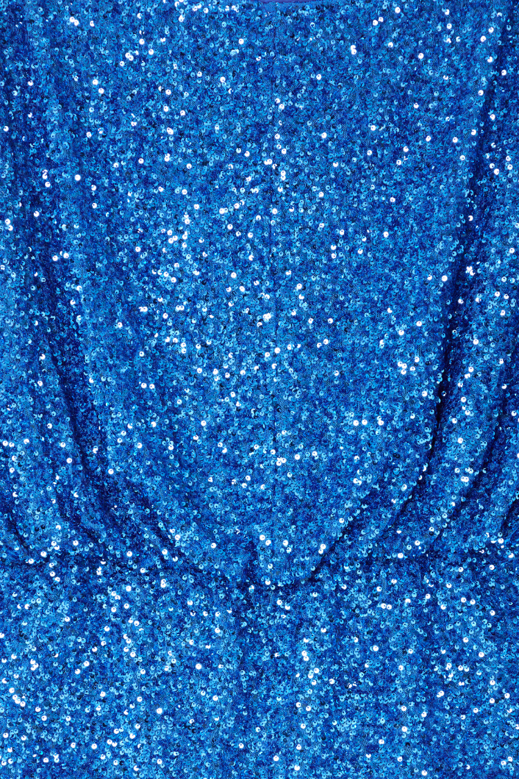 Blue Sequin Tilly Top detail highlighting the shimmering blue sequins and textured fabric.