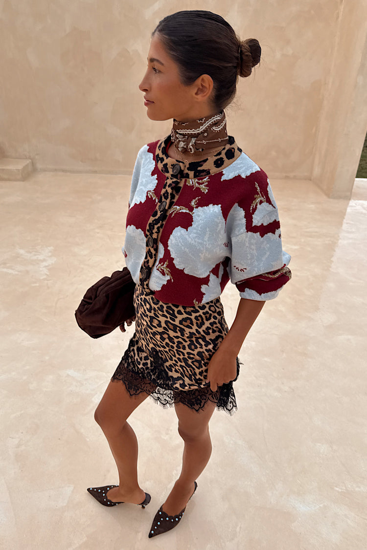 Burgundy & Blue Poppy Cardigan with leopard print trim, styled with a leopard skirt and lace hem.