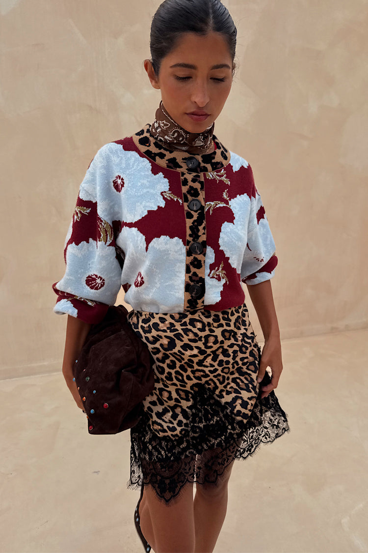 Burgundy & Blue Poppy Cardigan with leopard print trim, styled with a leopard lace skirt and brown neck scarf.